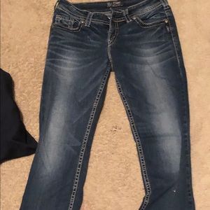 Dark wash, mid rise, slim boot cut Silver Jeans